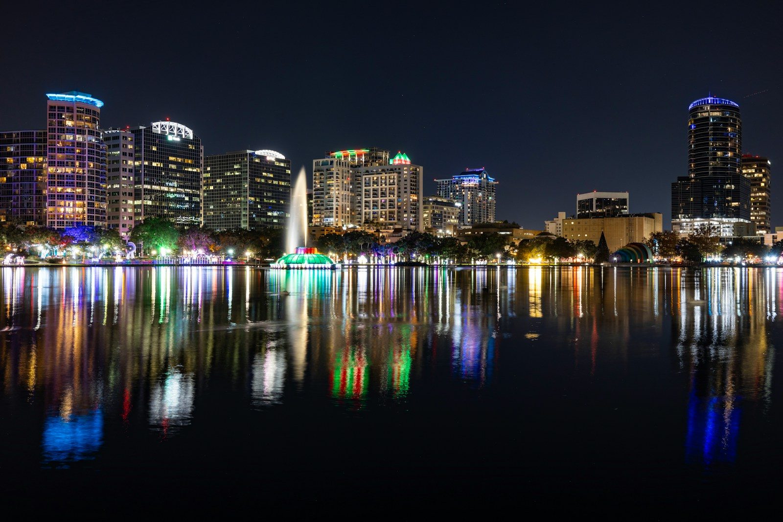 A view of a city at night from across the water